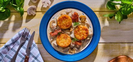 AVIKO Rösti Rondjes Naturel з печерицями та соусом бешамель (ciulama de ciuperci) і хрустким беконом